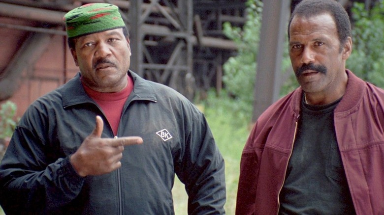 Jake pointing at John in "Original Gangstas"