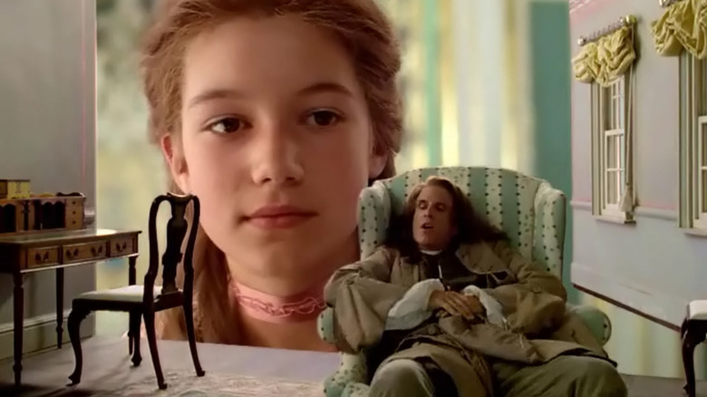 A Brobdingnagian girl looking in on Gulliver in Gulliver's Travels