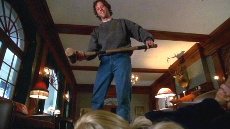 Jack Torrence holding a croquet mallet in The Shining