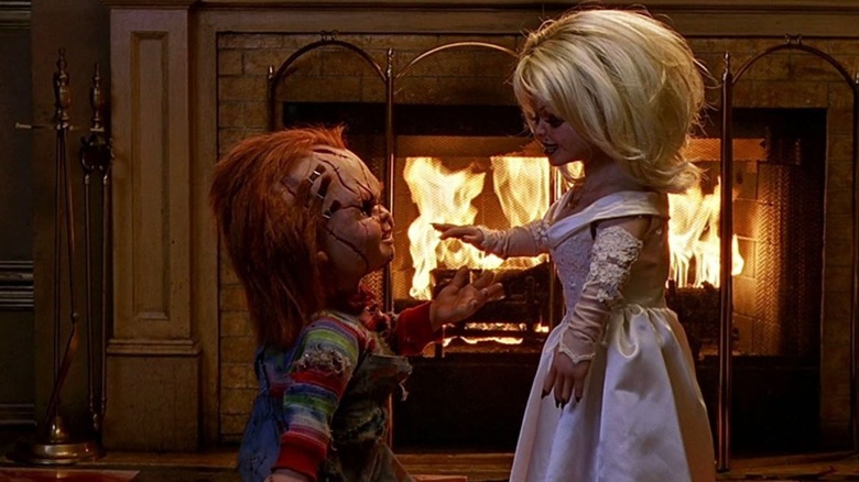 Chucky on his knee proposing to Tiffany in Bride of Chucky