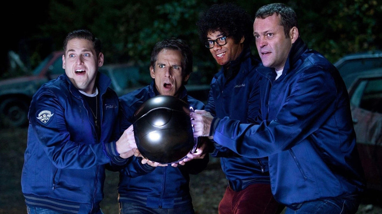 Franklin, Evan, Jamarcus, and Bob holding the alien orb in The Watch