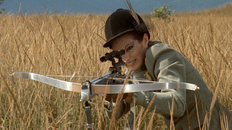 Jennifer with a crossbow in Turkey Shoot