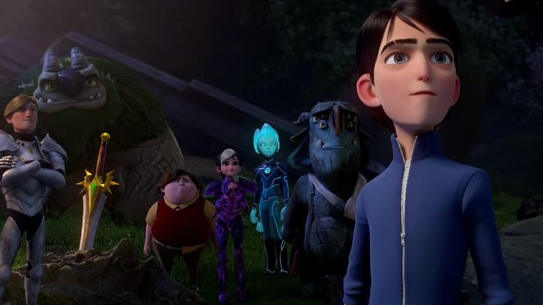 Jim surrounded by his friends and allies in Wizards: Tales of Arcadia