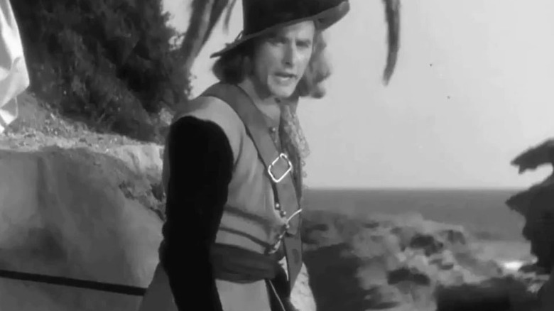 Peter Blood barking orders in Captain Blood
