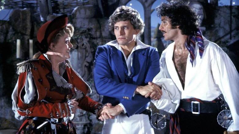 Ruth and the Pirate Kind both shaking Frederic's hands in The Pirates of Penzance