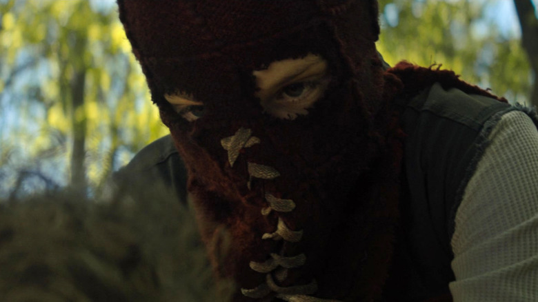 Brandon in his mask getting ready to kill Kyle in Brightburn