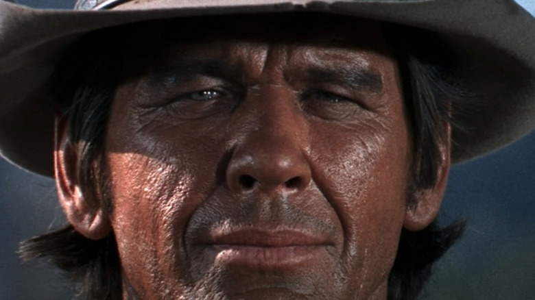 Charles Bronson's "Harmonica" is seen in closeup in Once Upon a Time in the West