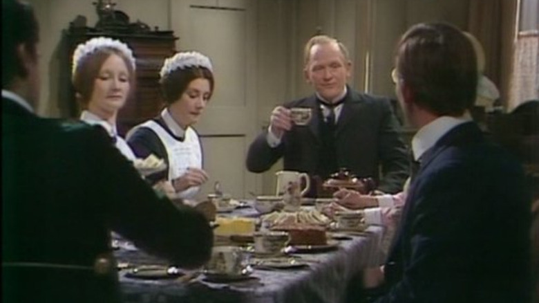 The staff sitting down for tea on Upstairs, Downstairs