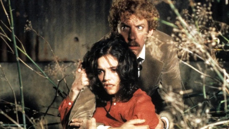 Donald Sutherland and Brooke Adams star in Invasion of the Body Snatchers (1978)