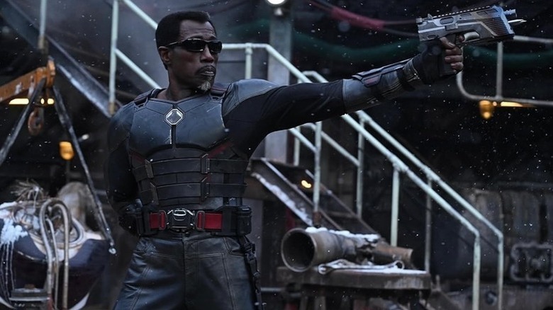 Blade firing a gun in Deadpool and Wolverine