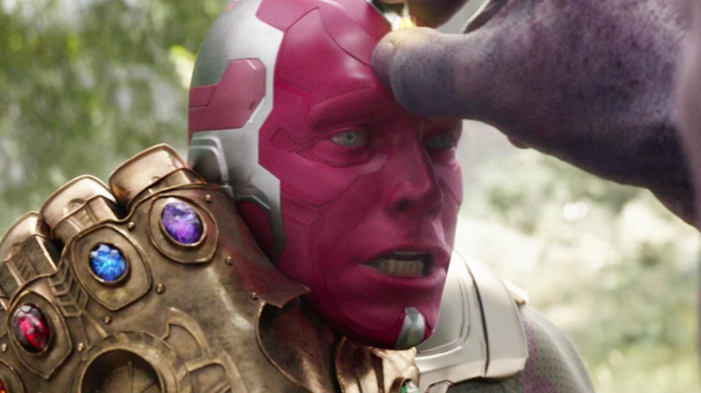 Thanos removing the Mind Stone from Vision's head in Avengers: Infinity War