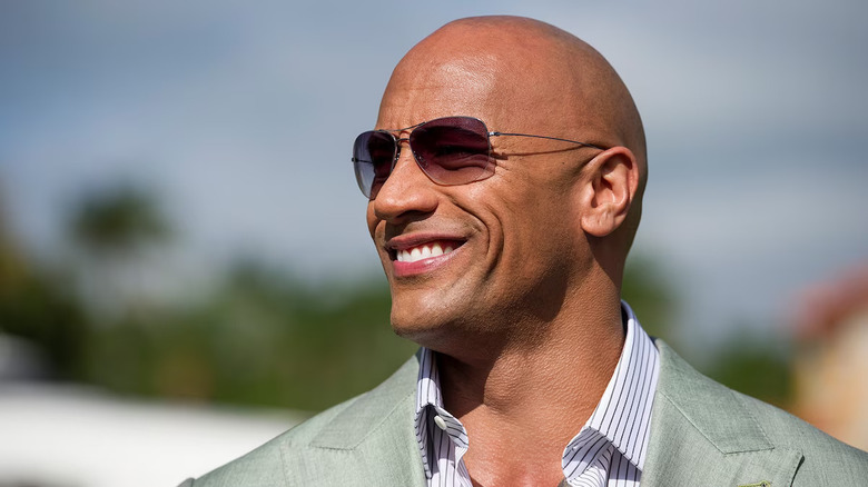 Spencer wearing sunglasses and grinning on Ballers