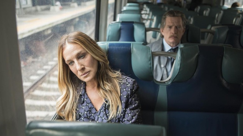 Frances and Robert in different rows on a train on Divorce