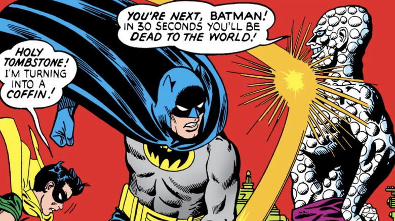 Batman punches The Outsider on the cover of Detective Comics #356
