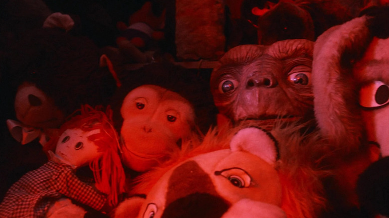 E.T. hiding among stuffies in E.T. the Extra-Terrestrial