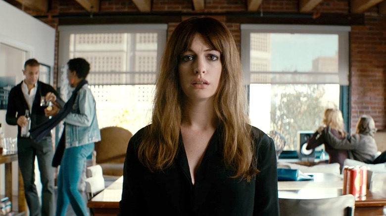 Anne Hathaway as Gloria looking distressed in Colossal