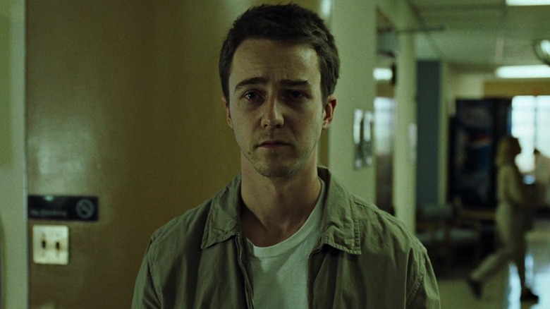 The narrator with a bandage on his head in Fight Club