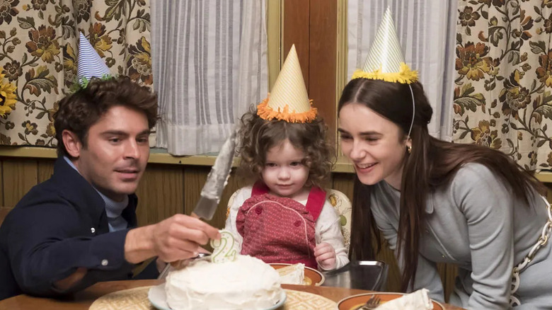 Ted Molly and Kendall cutting a birthday cake in Extremely Wicked, Shockingly Evil and Vile