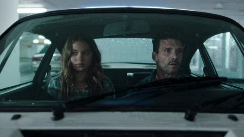 Caitlin Carmichael as Katie sitting next to Frank Grillo as the Wheelman in his car in Wheelman