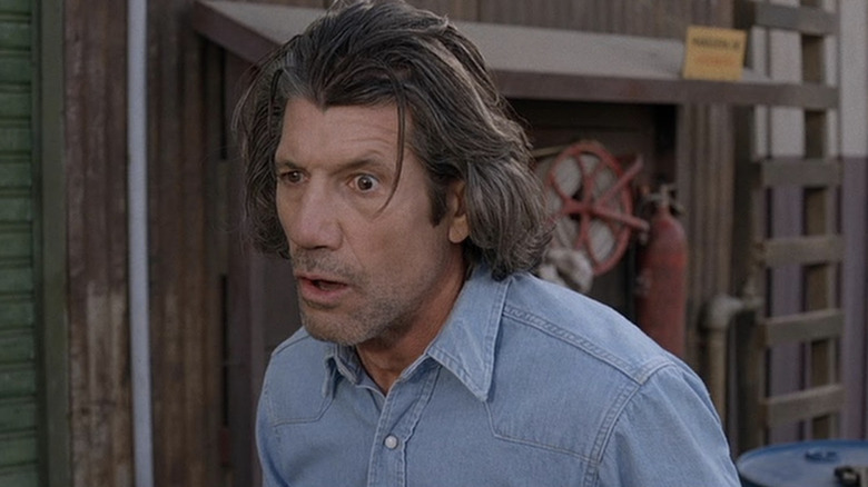 Fred Ward as Earl Bassett in Tremors 2: Aftershocks