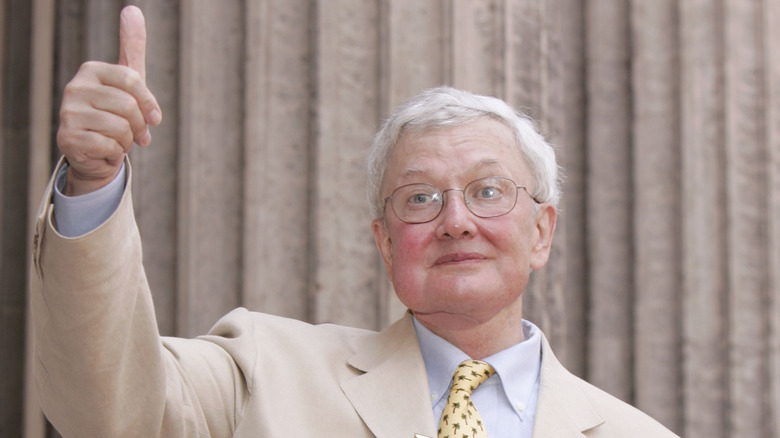 Roger Ebert giving a thumbs-up during his Walk of Fame induction