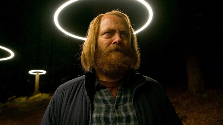 Nick Offerman's Forrest stand beneath an artificial halo in Devs