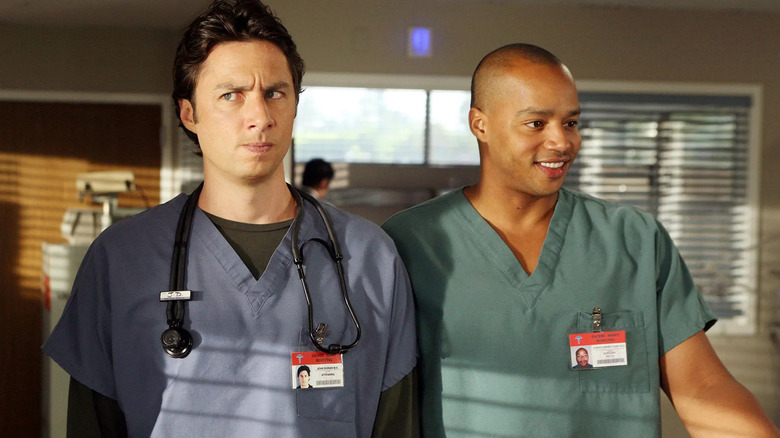 JD smirking and Turk smiling on Scrubs