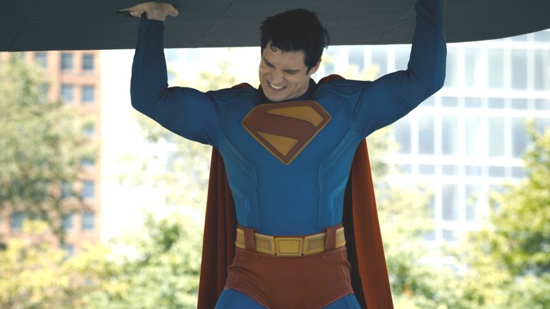 Superman lifting the foot of a kaiju in Superman