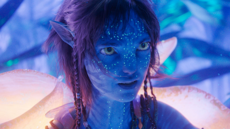 Sigourney Weaver as Kiri with a look of concern on her face in Avatar: Fire and Ash