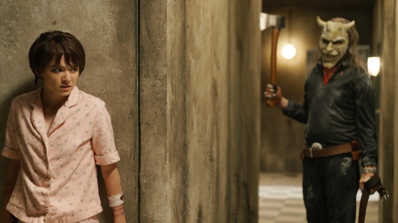 Madeleine McGraw	as Gwen hiding from Ethan Hawke as The Grabber in Black Phone 2