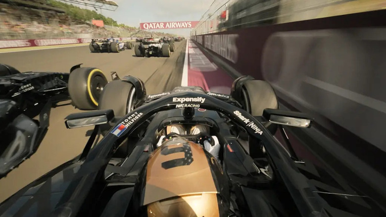 A car being forced into the wall during a race in F1: The Movie