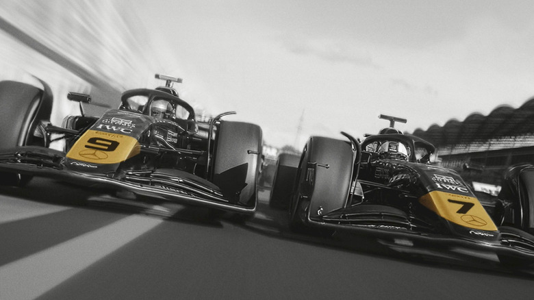 Two cars racing side by side on the poster for F1: The Movie