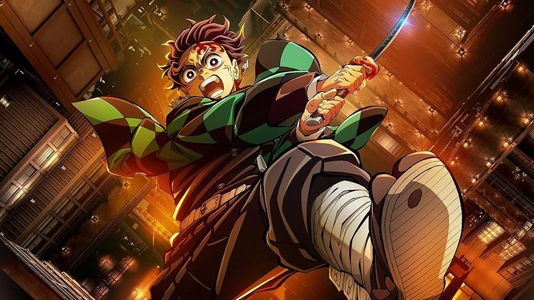 Tanjiro brandishing his sword on the poster for Demon Slayer: Kimetsu no Yaiba - Infinity Castle