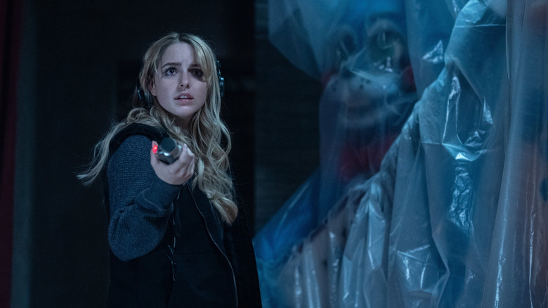 McKenna Grace as Lisa using her recorder at Freddy Fazbear's in Five Nights at Freddy's 2