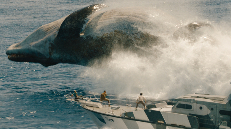 The mosasaurus jumping out of the water by the boat in Jurassic World Rebirth