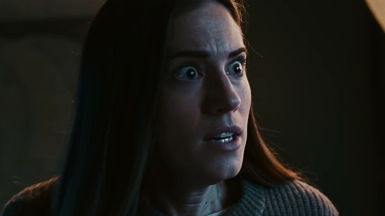 Allison Williams as Gemma with a shocked look on her face in M3GAN 2.0