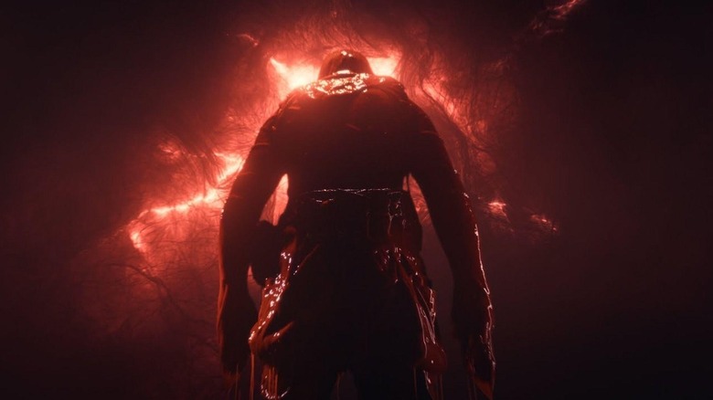 The Convict looking up at a bloody sky in Iron Lung