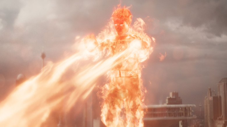 Joseph Quinn as Johnny Storm on fire and flying using his powers in The Fantastic Four: First Steps