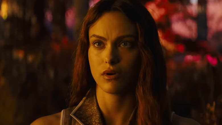 Camila Mendes as Teela watching He-Man lift a ship in Masters of the Universe (2026)