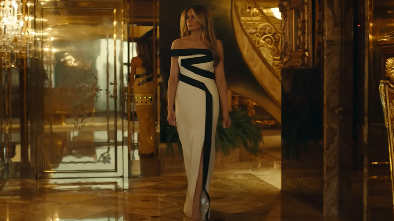 Melania Trump walking out in her white and black dress in Melania