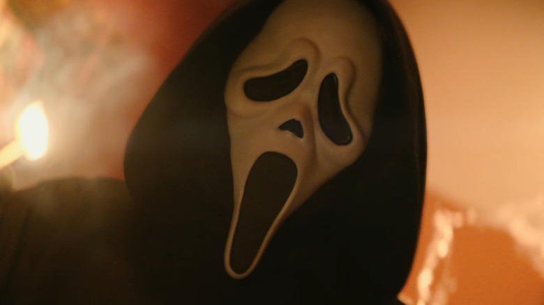 Ghostface holding a match in Scream 7
