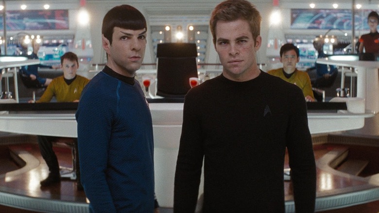 Zachary Quinto as Spock standing beside Chris Pine as Kirk on the bridge of the Enterprise in Star Trek (2009)