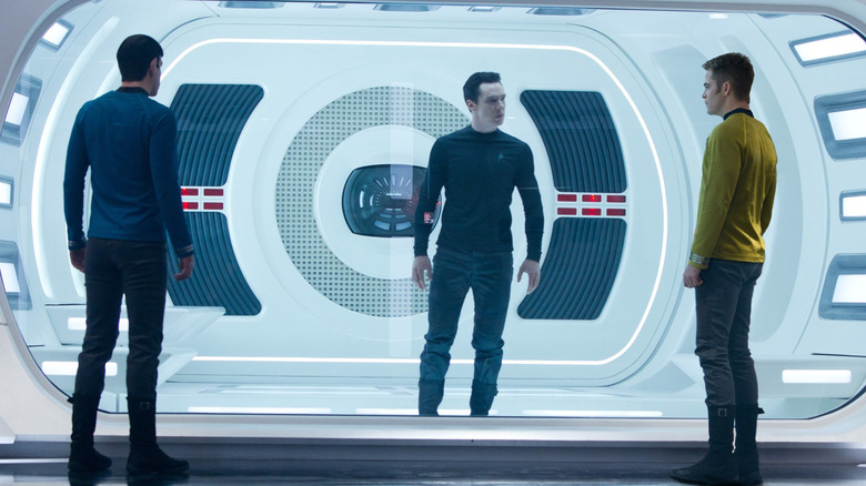 Spock and Kirk looking at Khan in his cell aboard the Enterprise in Star Trek Into Darkness