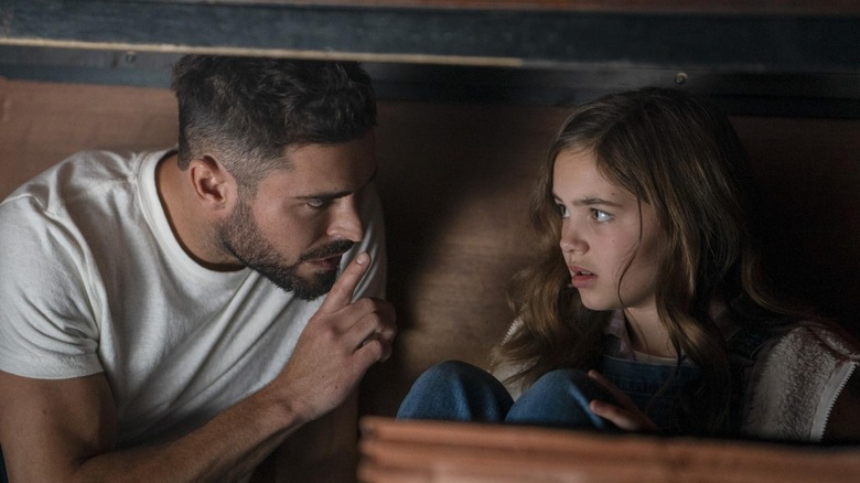 Andrew telling Charlie to be quite while hiding in Firestarter (2022)