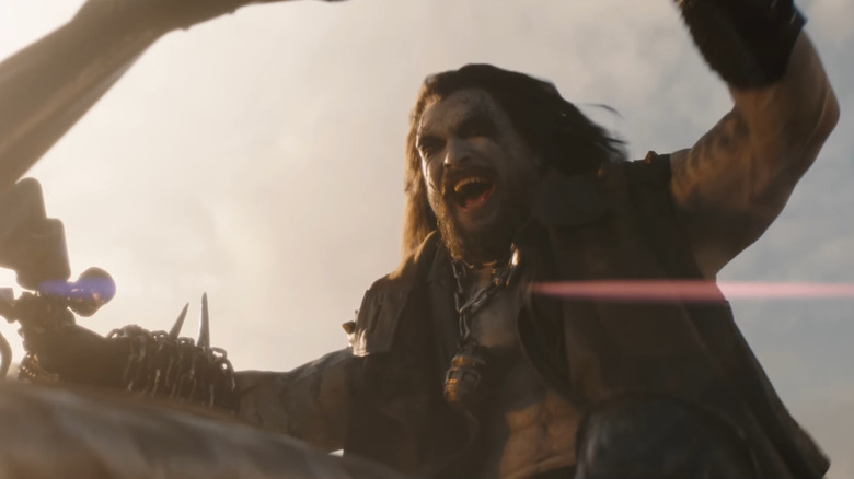 Jason Momoa as Lobo riding his space motorcycle in Supergirl