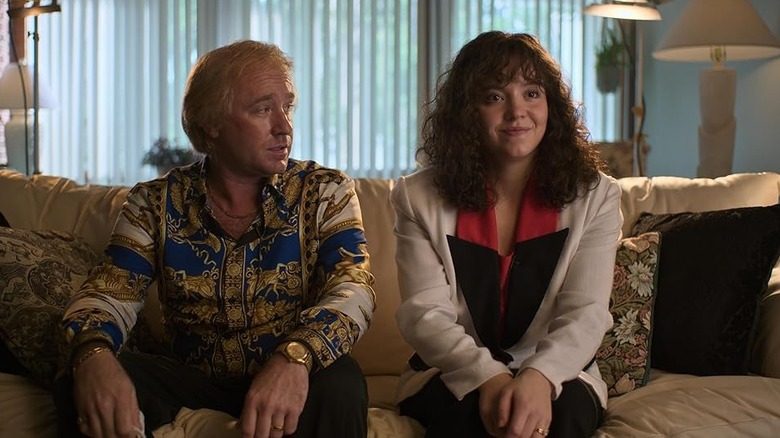 Jim Martin (Ben Foster) and Christy Martin (Sydney Sweeney) sit together on a couch in Christy