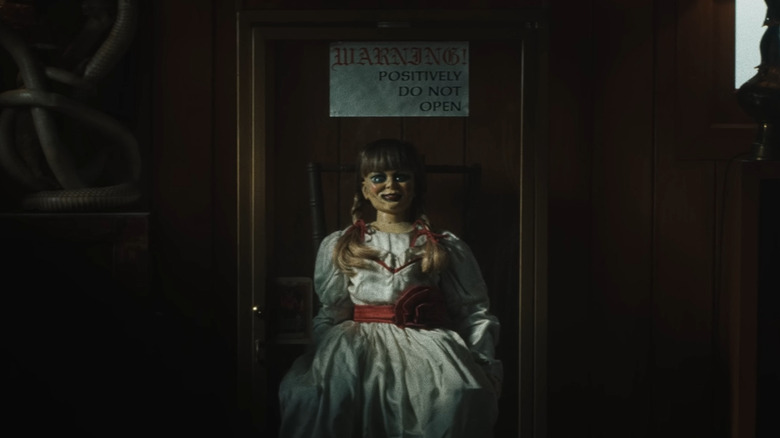 The Annabelle doll in a case in the Warren's home in The Conjuring: Last Rites