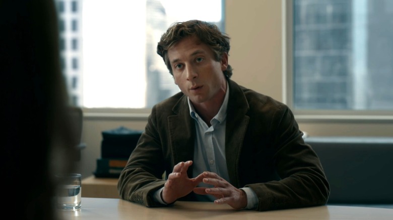 Jeremy Allen White as Jeff Horwitz sitting at a conference table in The Social Reckoning