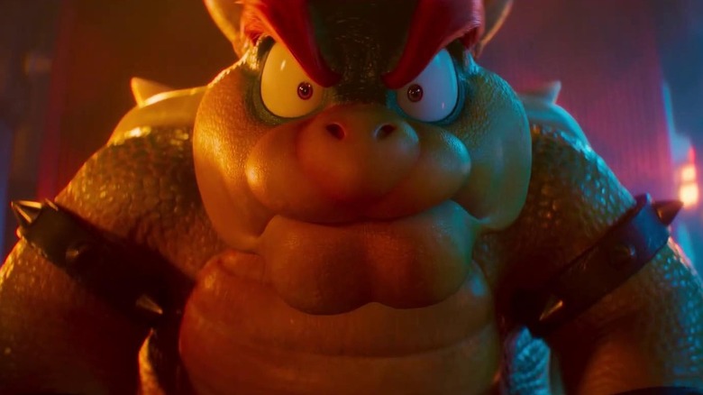 A close up of Bowser with wide eyes in The Super Mario Galaxy Movie