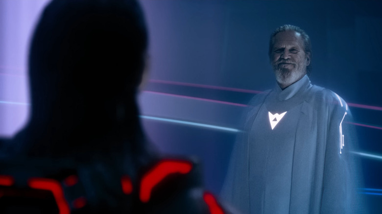 Jeff Bridges as Flynn looking at Jared Leto as Ares in Tron: Ares